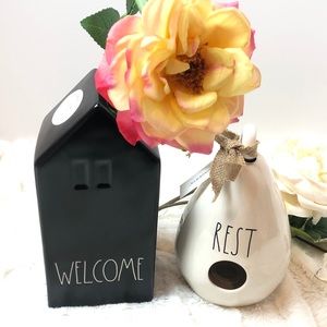 “Welcome” black vase with “Rest” birdhouse